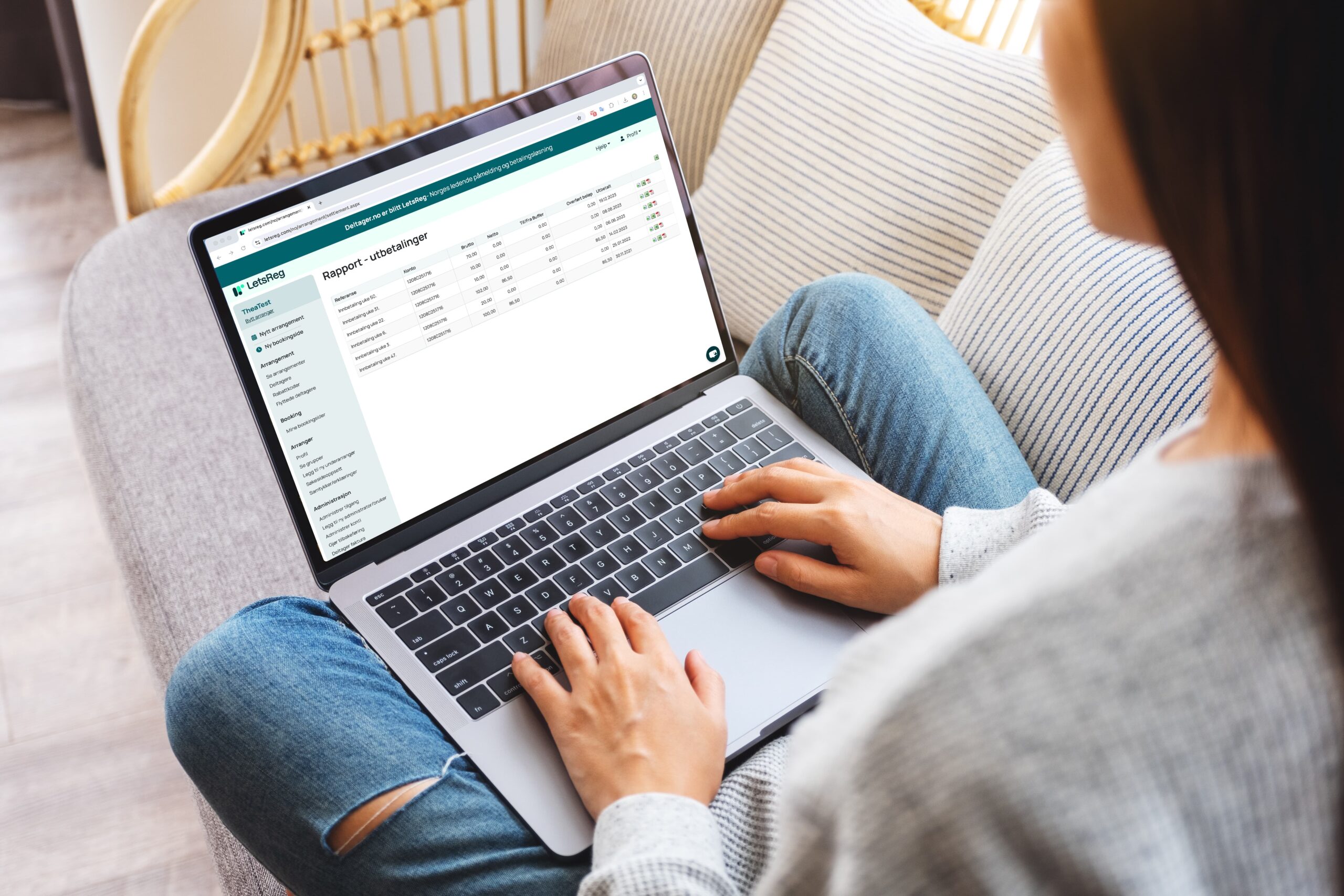 A woman use LetsReg on a laptop to watch reports