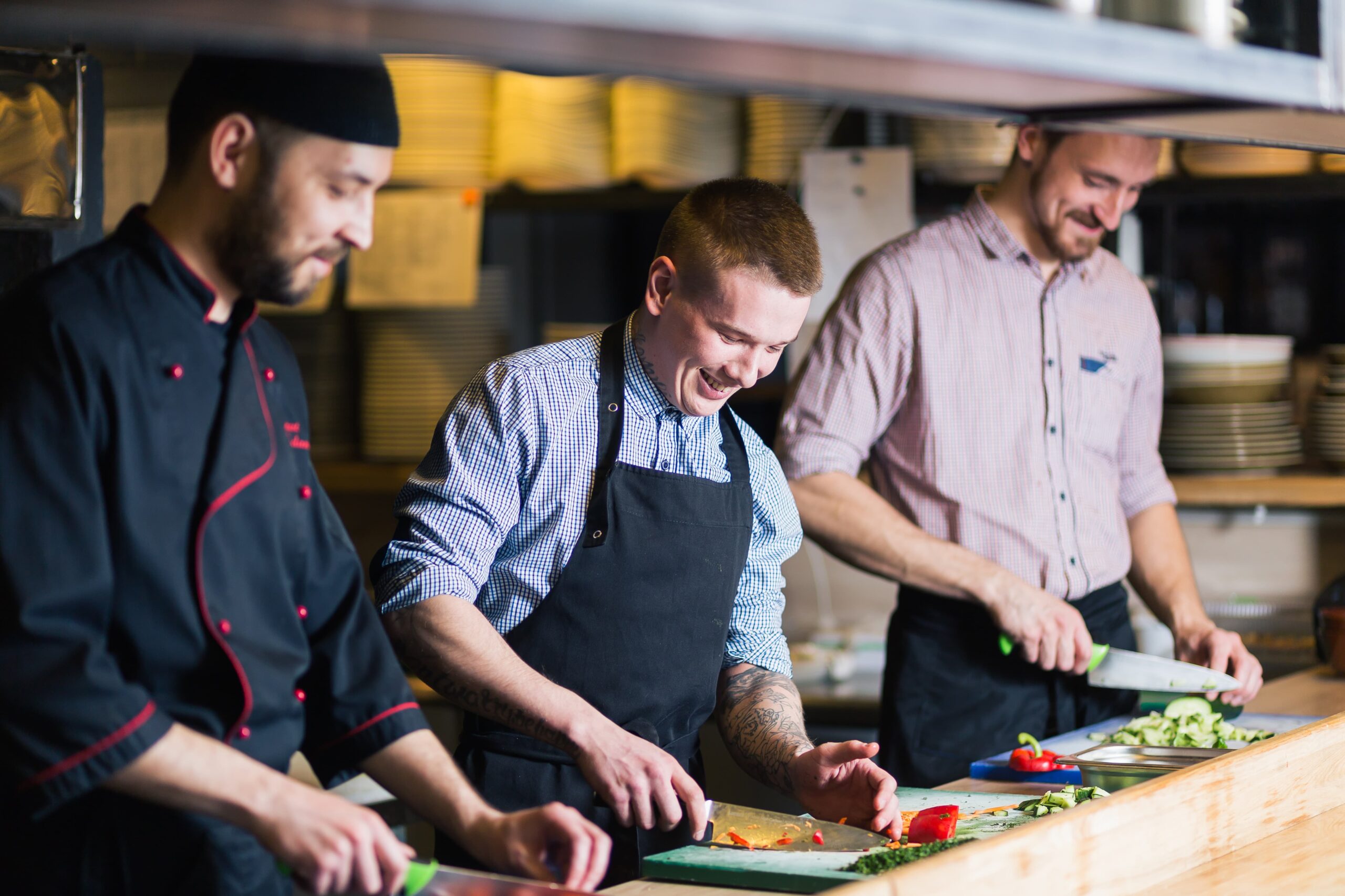 Colleagues participating in a teambuilding activity with dinner on the menu.